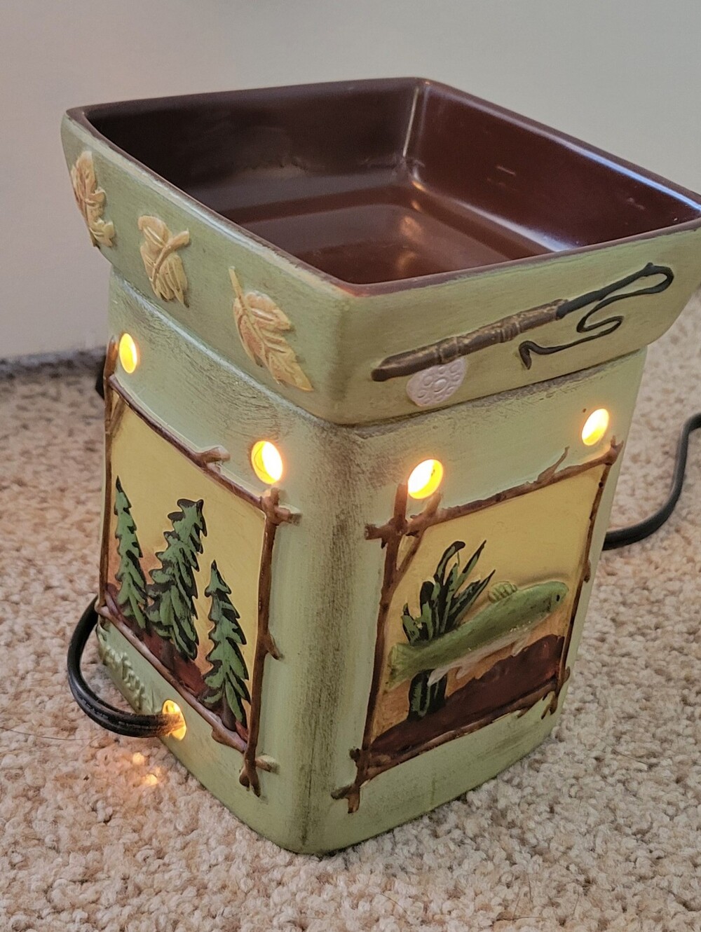 Scentsy "Lodge" full-size wax warmer featuring rustic outdoor scenes.